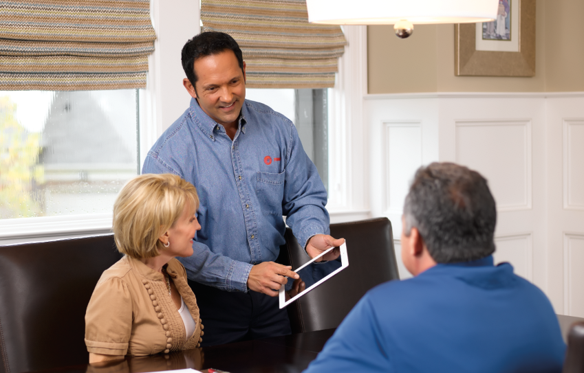 Contractor talking with clients 