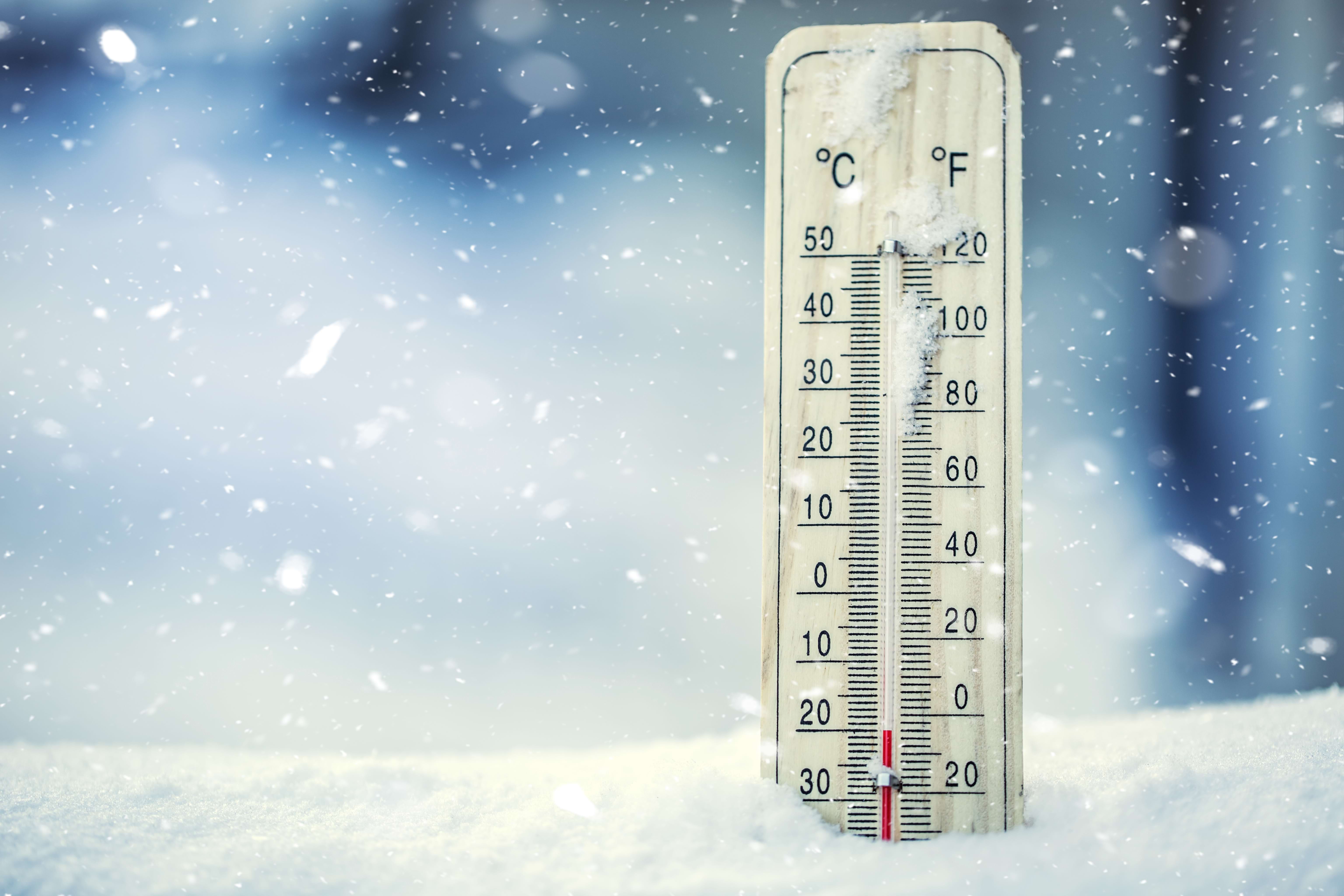frozen thermometer in the snow 